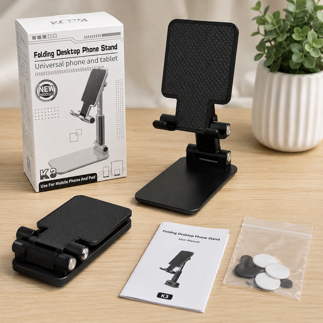 Soporte plegable K3 para teléfono móvil o tableta, diseño ajustable y compacto que brinda estabilidad y comodidad para ver contenido, realizar videollamadas o trabajar.