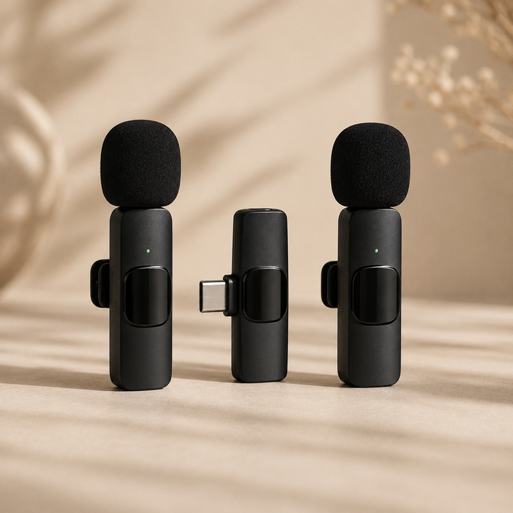 Micrófono inalámbrico K9 con dos transmisores, receptor USB, cable de carga y manual de usuario para grabación de audio y creación de contenido.